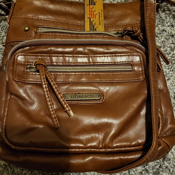 Stone & CO smoking mountain bucket cross body in the color Cognac - Picture 10 of 14